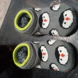 Cozy Penguin Slippers with Gray and Green Accents